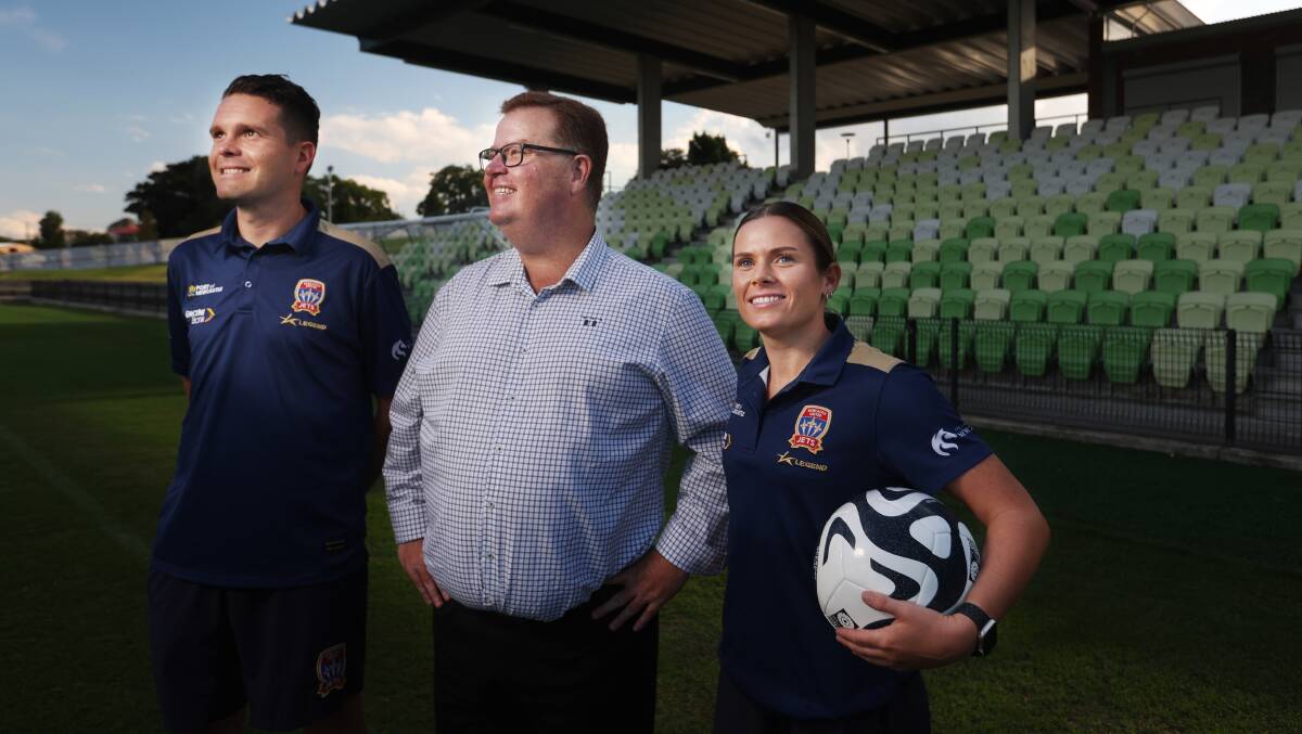 Newcastle Jets A-League Women's captain Cassidy Davis with Maitland mayor Philip Penfold and Newcastle Jets coach Ryan Campbell. Picture by Simone De Peak