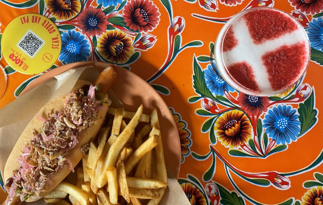 The "There's Something About Mary" cocktail and the "El Frederiko" hot dog, served at the Slip Inn in Sydney for the Danish coronation. Picture by Brianna Hedges