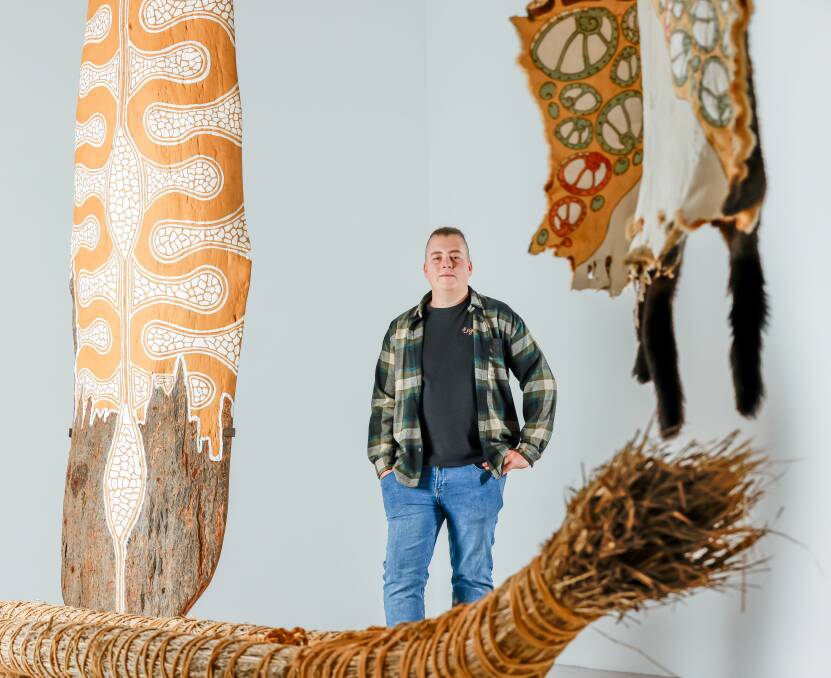 Mitch Mahoney with his work on display in My Country: Country Road + NGV First Nations Commissions at the Ian Potter Centre, NGV Australia Melbourne. Picture by Tim Carrafa