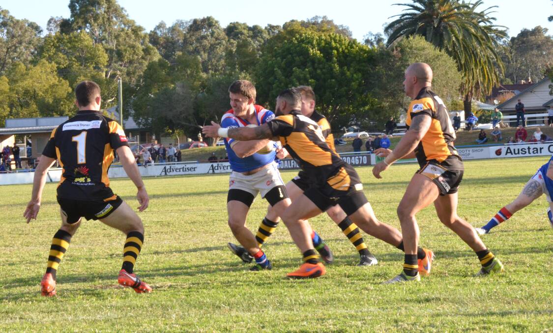 PHYSICAL: Saturday's Coalfields clash between Kurri Kurri and Cessnock lived up to its usual intensity. Picture: KRYSTAL SELLARS