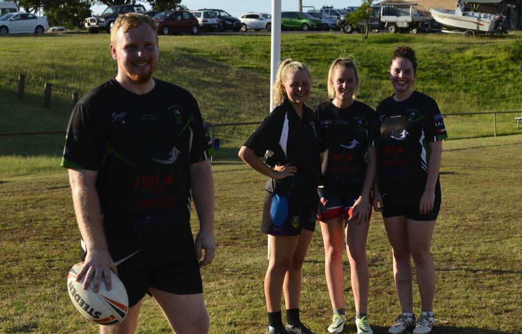 EXCITING TIMES: Pickers Ladies League Tag coach Adam Martin with players Kathleen Maier, Emman Martin and Brittany Morrison at training on Tuesday. Picture: Michael Hartshorn