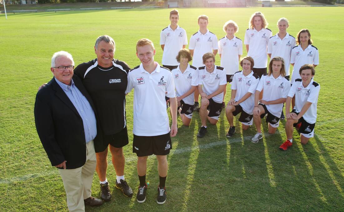 TRIBUTE: Peter Hedges, president of East Maitland RSL, joins Maitland Magpies coach Ian Mather, captain Cameron Innes and the team. Picture: MAX MASON-HUBERS