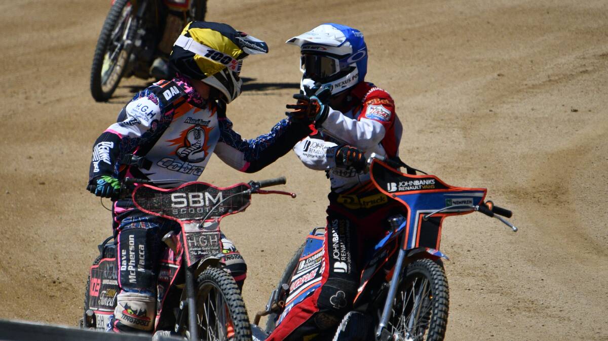 RED-HOT: Rohan Tungate (left) and Joshie Pickering embrace after their thrilling contest in the NSW Speedway title.