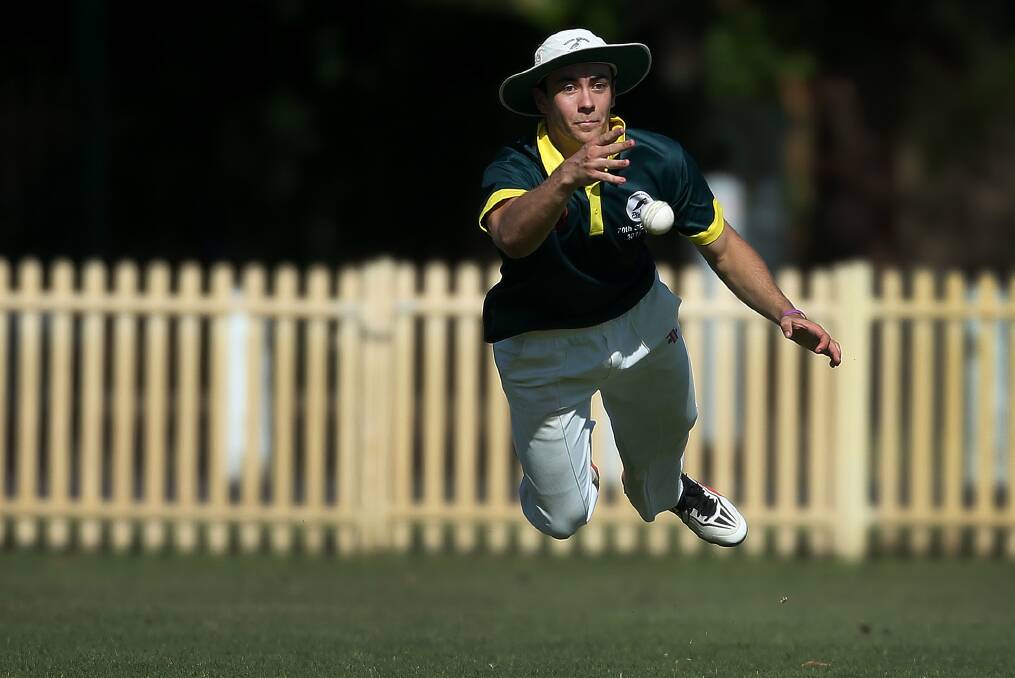 AGONISINGLY CLOSE: Western Suburbs' Stefani Beetge comes agonisingly close to pulling in a diving catch against Tenambit Morpeth Bulls. Picture: Marina Neil