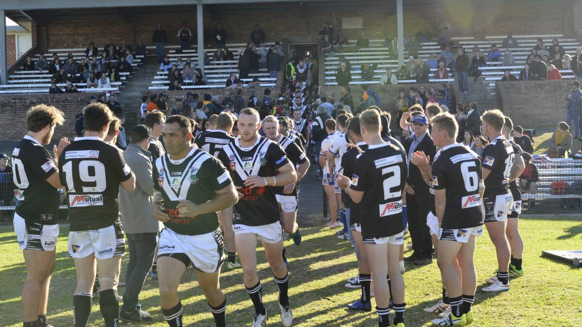 ONE LAST TIME: PJ Elllis leads the Pickers out in his final game for the club and the club's final game at the Maitland Sportsground: Picture: MICHAEL HARTSHORN