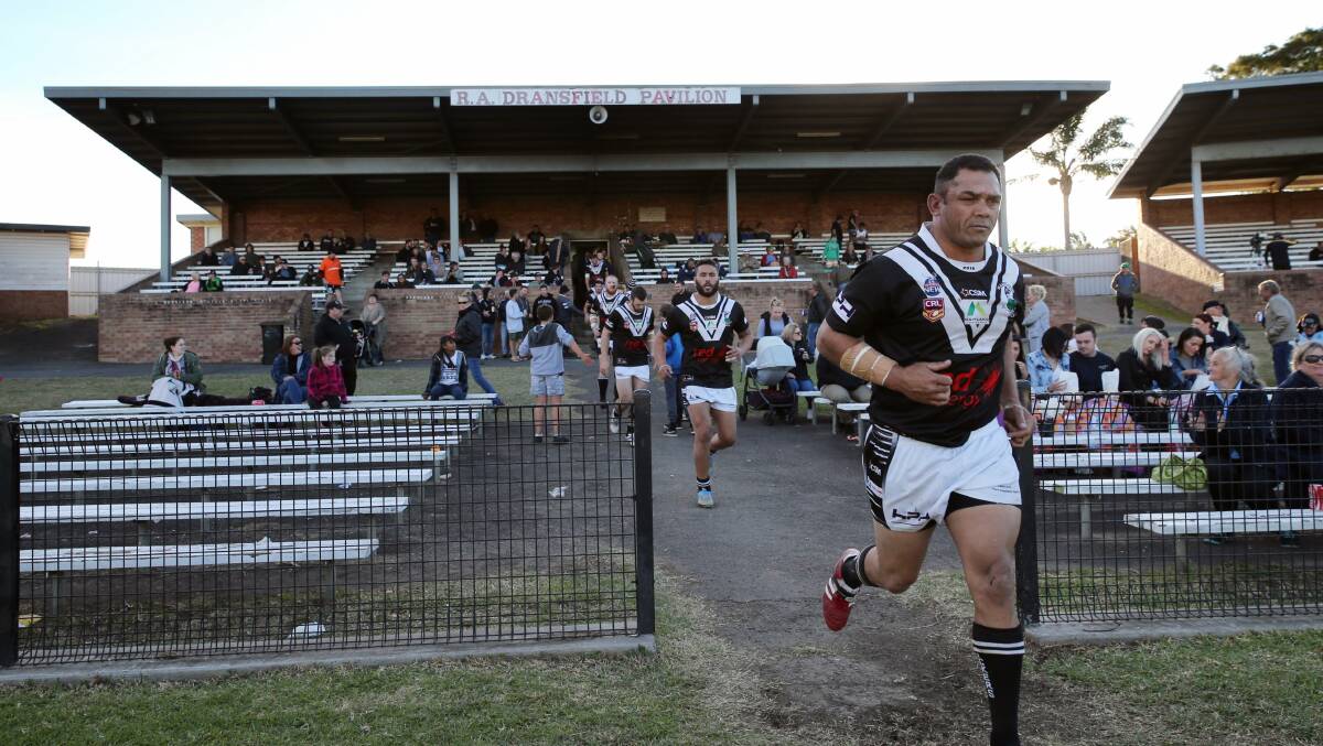 ONE LAST TIME: Pickers legend PJ Ellis lead the team out for one last time. Picture: MAX MASON-HUBERS