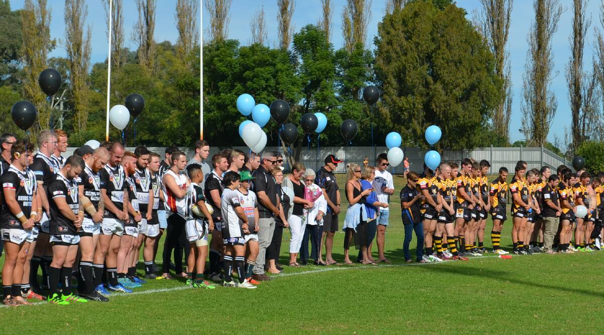 TRIBUTE: Maitland and Cessnock players marked a minute's silence before their game last year in honour of former Pickers reserves player Harry Hofman.