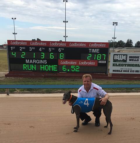 TRACK RECORD: Queensland trainer Darren Russel with new Maitland 400m track record holder Precious Sal after winning the Old Maitland Inn Stakes in 21.87s.