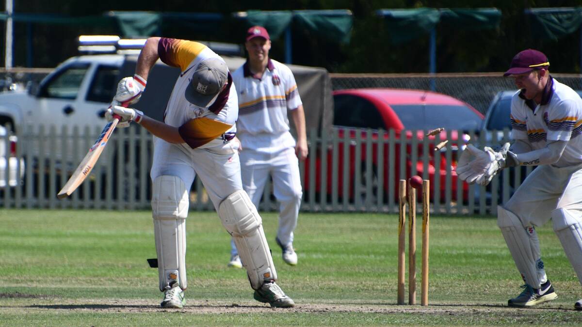 BOWLED: Maitland keeper Jarrod Moxey watches as Singleton's Alex Thrift is beaten by a Dan Willis delivery. Picture: Michael Hartshorn