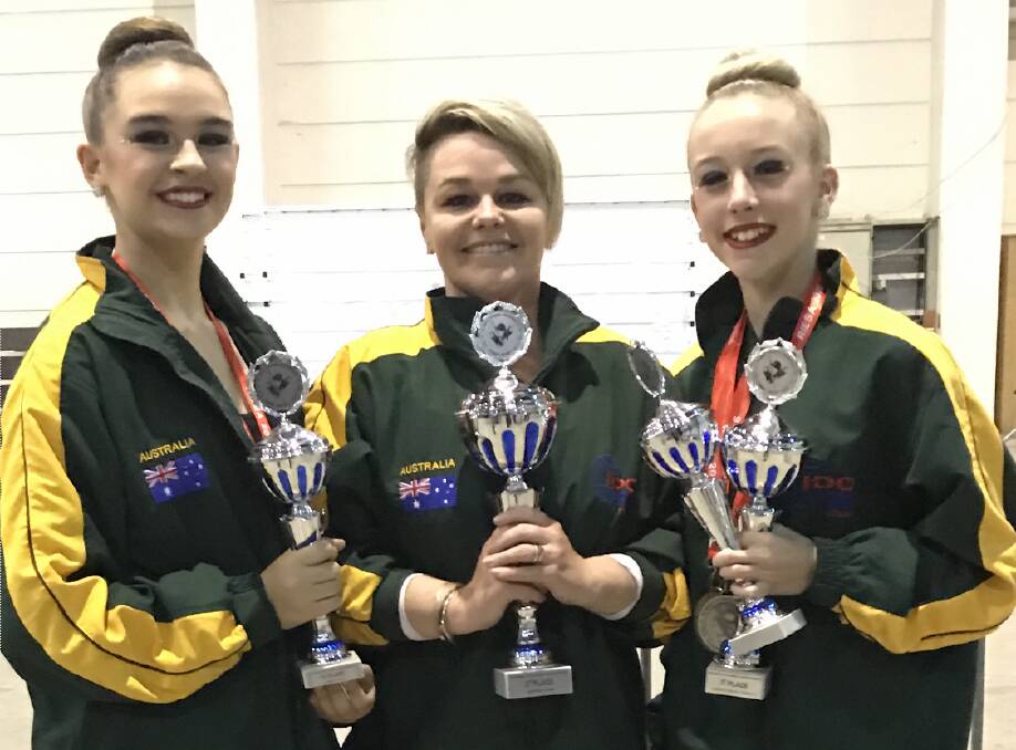 FIERCE COMPETITION: Kyla Borghero, Kelly Sloan Egan and Tayla Minchinton at the IDO World Tap Dance Championships in Germany in December.