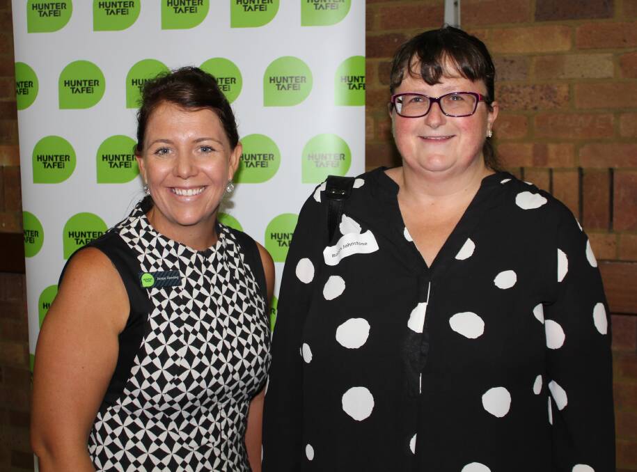 ACHIEVEMENT: Robyn Johnstone (right) at the Hunter TAFE graduation ceremony with head teacher of nursing, Jacqui Handley. Picture: Hunter TAFE