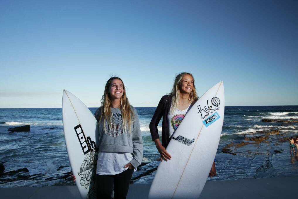 RIDING A WAVE: Pro surfers Philippa Anderson and Elle Clayton-Brown at Merewether beach, where Surfest is held. The crowd-funding model behind the women's competition will be expanded in 2017. Picture: Simone De Peak