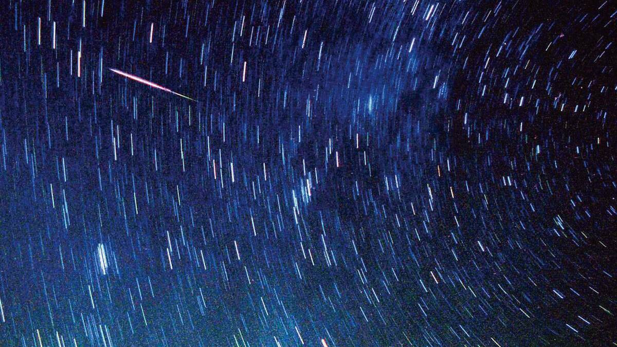 HOT STREAK: A meteor streaks past stars 