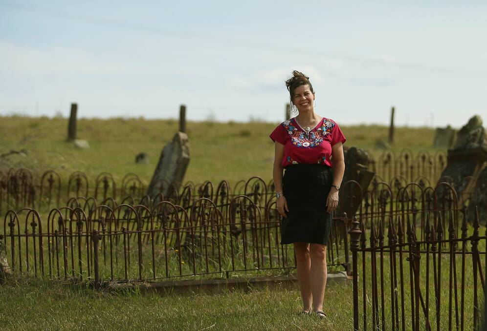 WINNER: Maitland council's heritage officer Clare James in the Glebe Cemetery in East Maitland. Picture: Marina Neil.