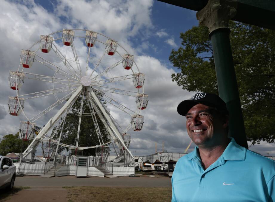 READY TO ROLL: The Italian-made Ferris Wheel, pictured with its owner Greg Webster, is set to be a key attraction at Maitland Show from Friday to Sunday.