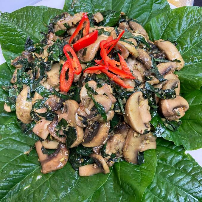 Felicia Nguyen's mushroom stir fry served on fresh betel leaves. Picture supplied 