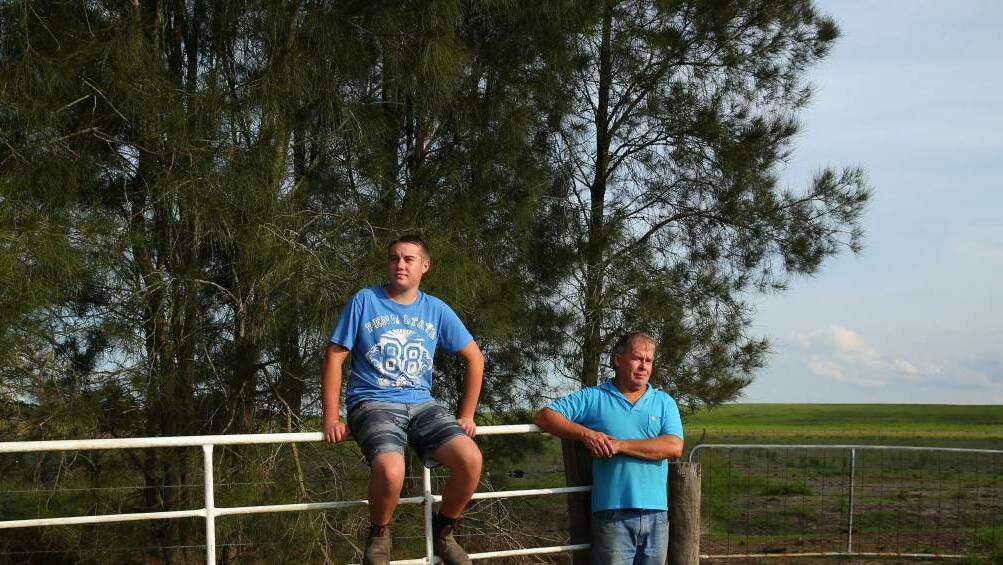 SURVIVORS: Nelsons Plains farmer Peter Manuel and his son Michael, who saved him from raging flood water during the 2015 April super storm. Picture: Max Mason-Hubers