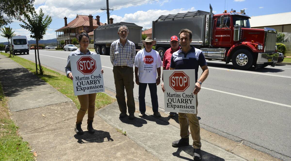 PLEASE EXPLAIN: Concerned residents Kristy Buttsworth, Tom Collins, Owen Coakes, Wally Fletcher and Robert Holt in Paterson's main street. Picture: Belinda-Jane Davis