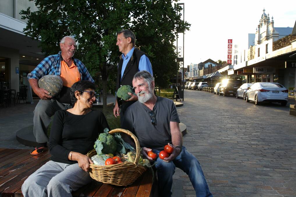 MARKET: Farmer Tony Milburn (back left), with Slow Food representatives Amorelle Dempster (front left), Keith Pearson (back), and Terry Kavanagh (right).
