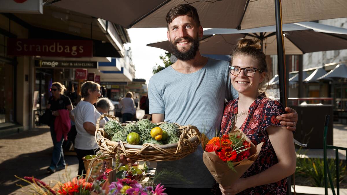 WINTER DELIGHTS: Farmers Tom Christie and Dominique Northam sell their food at Maitland produce market. Picture: Max Mason-Hubers