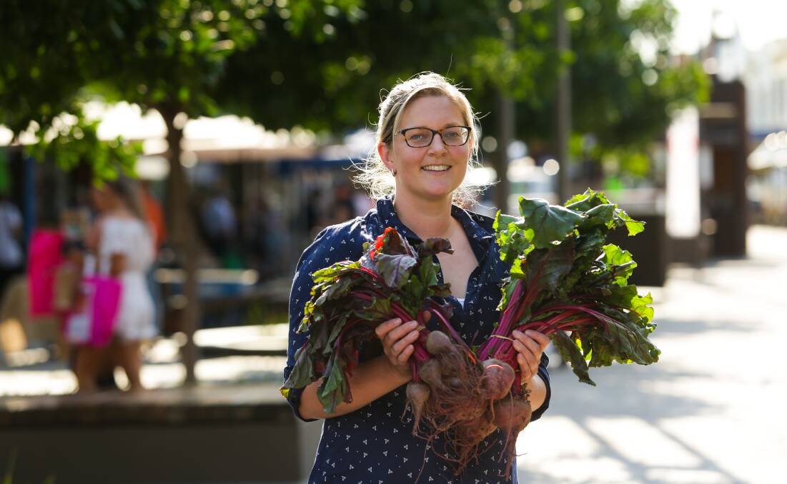DRY TIMES: Little Hill Farm's Kelly Eaton with some of the beetroot that loves hot and dry conditions. Picture: Jonathan Carroll