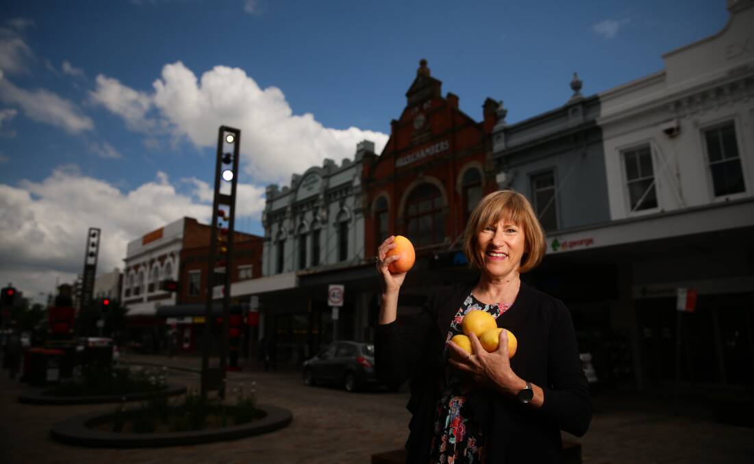 RESCUE PLEA: Slow Food Hunter Valley vice president Helen Hughes with some Kensington Pride mangoes. Picture: Jonathan Carroll. 