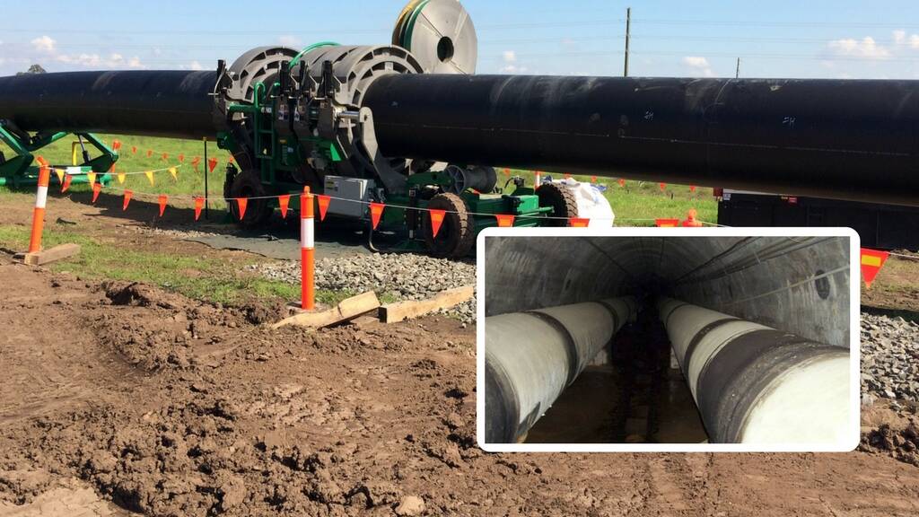 NEW CHAPTER: The new pipeline is being put together at Osterley to replace the original twin pipes that sit under the Hunter River (inset).