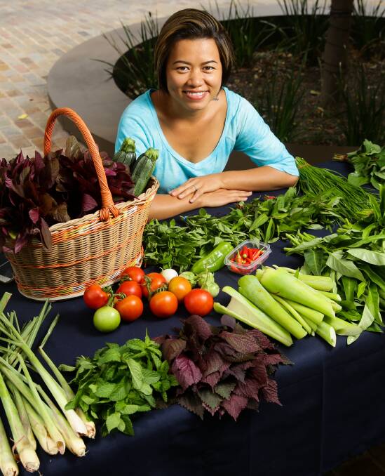 COOKING LESSON: Backyard grower Felicia Nyugen will showcase her skills in the kitchen at the Slow Food Earth Market in The Levee on Thursday. Picture: Jonathan Carroll.