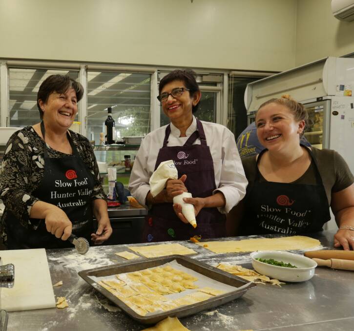 CALLING ALL CHEFS: Slow Food Hunter Valley leader and chef Amorelle Dempster (centre) with volunteer Ruth Adams and Aly Brod. 