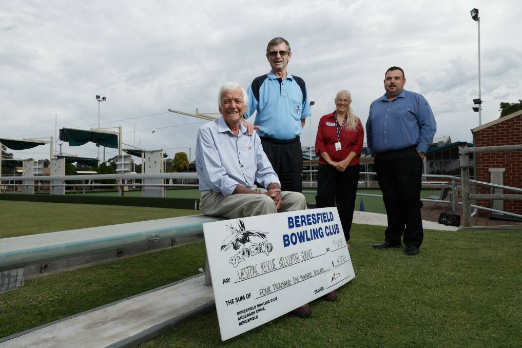 HELPING HAND: Maitland Support Group's Peter Brereton, Beresfield Bowling Club president Des Skinner, group member Virginia Milne and club CEO Ian Frame.