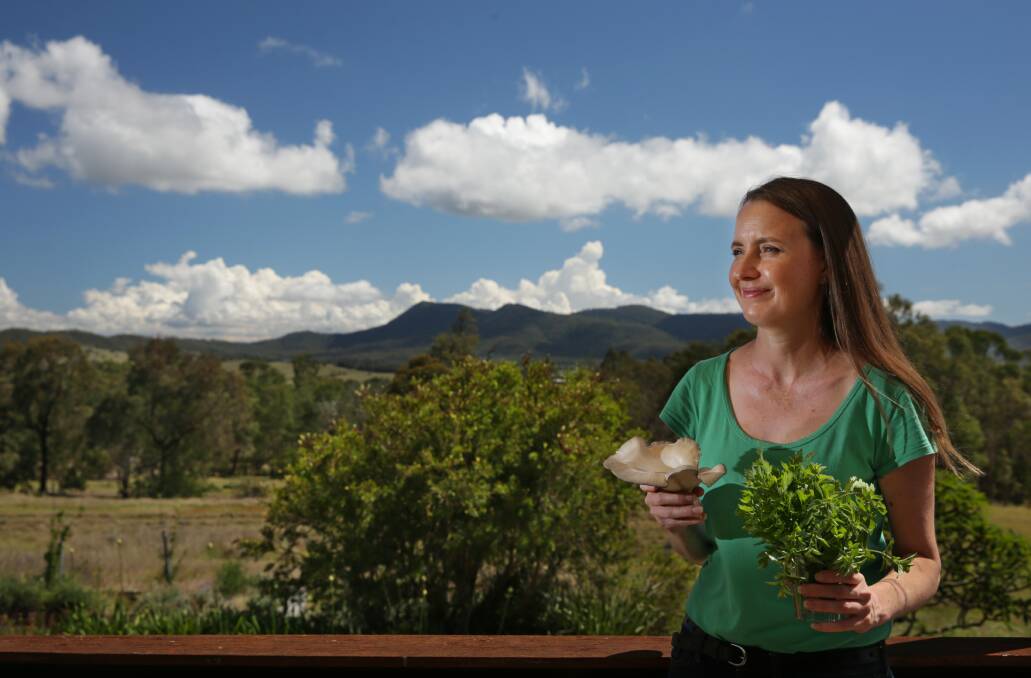 AT HOME: Slow Food Hunter Valley's Eat Local Challenge winner Cecily Lenton with some of the produce she grows at her home. Picture: Simone De Peak.