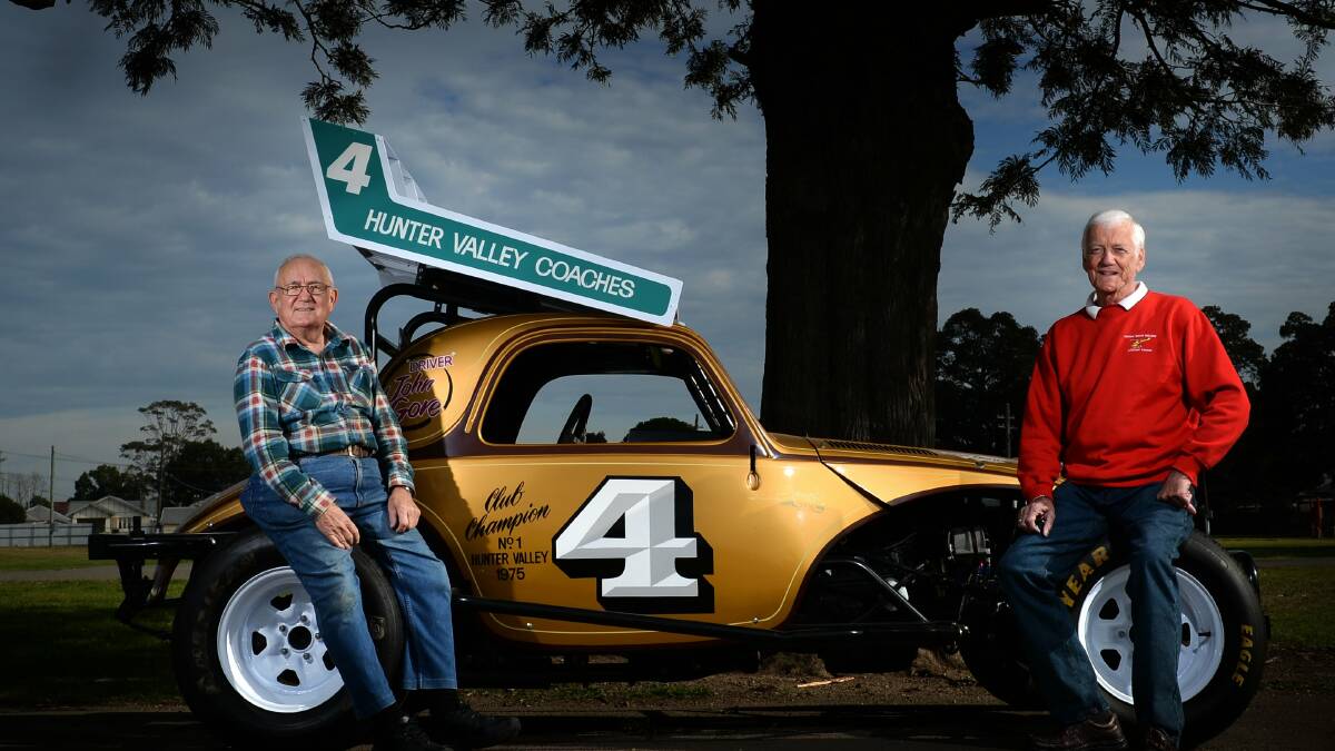 DONATION: Peter Brereton, right with, John Gore and his Dirt Hot Rod at the 2014 Maitland Motorfest which donated proceeds to the Westpac Helicopter Maitland Support group. Picture: MARINA NEIL
