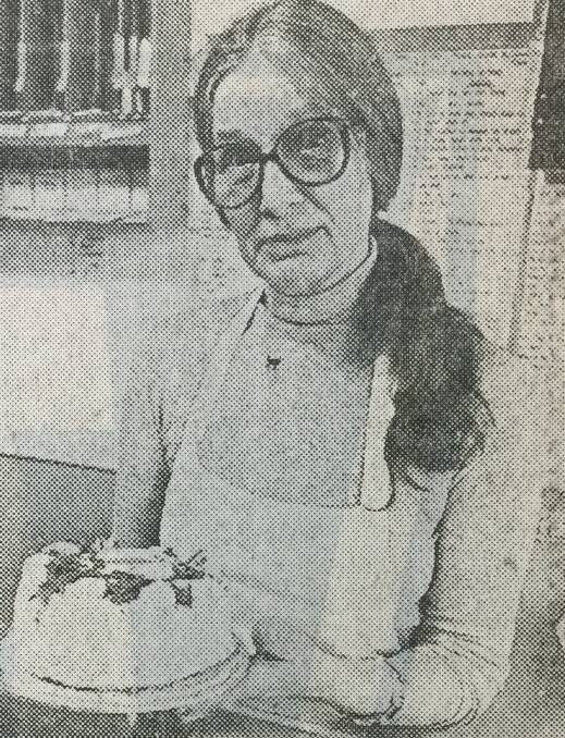 MOUTHWATERING: Ann Ruygrok with one of her husband Ton's cakes at the Dutch Cake Shop in High Street, Maitland. 