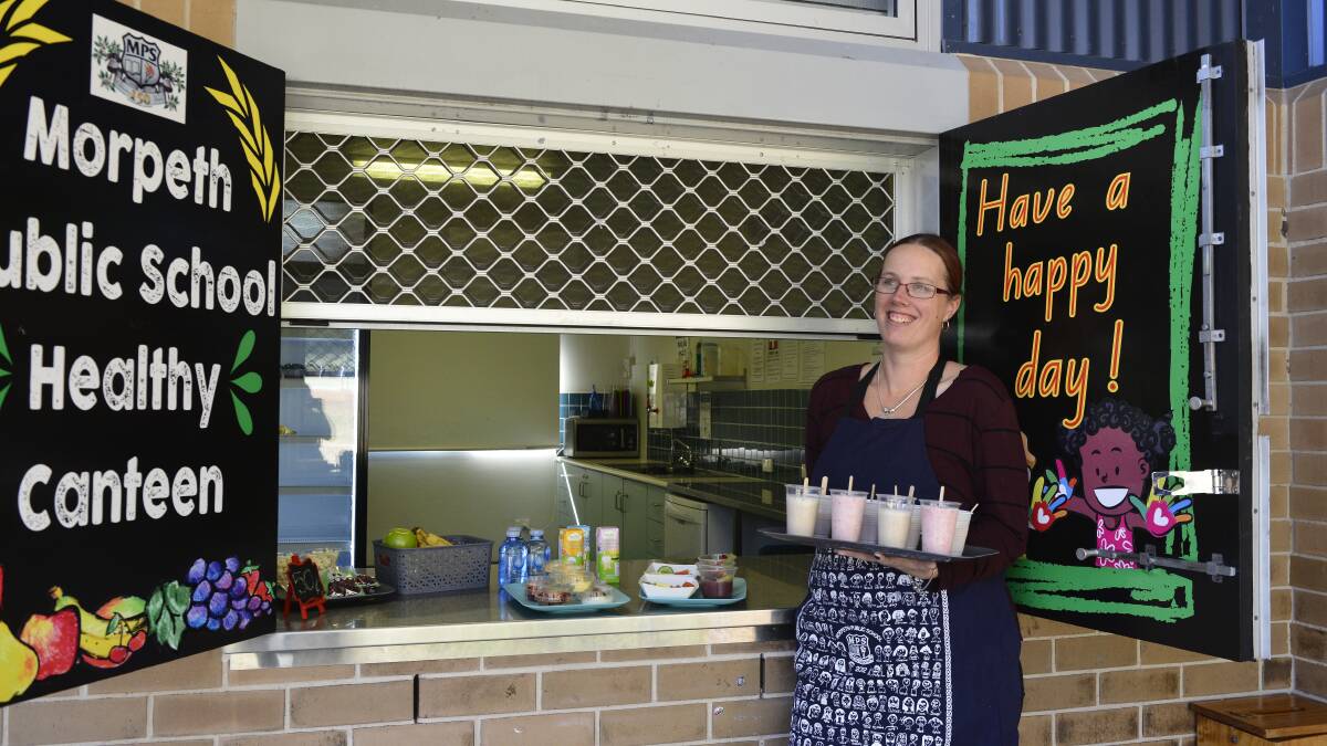 Morpeth Public School canteen manager Rebecca Buehler with some of the healthy snacks. Picture: Belinda-Jane Davis