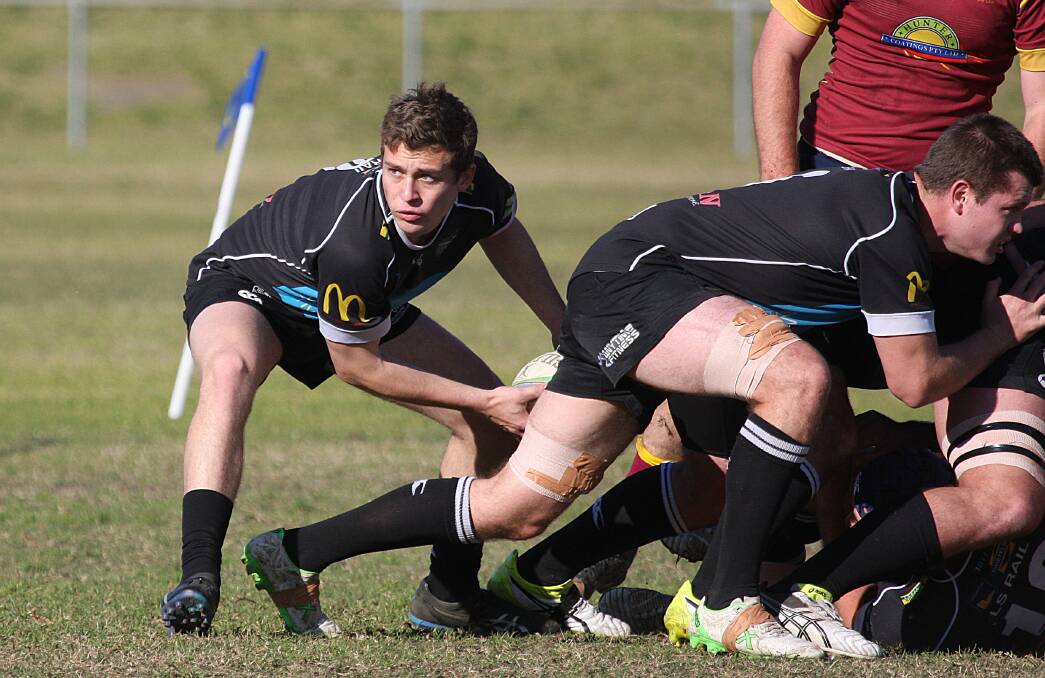 RISING STAR: Teenager Ben Taylor distributes the ball from the back of a scrum in the Blacks' 31-19 win over Lake Macquarie. Picture: Mikael Gaal