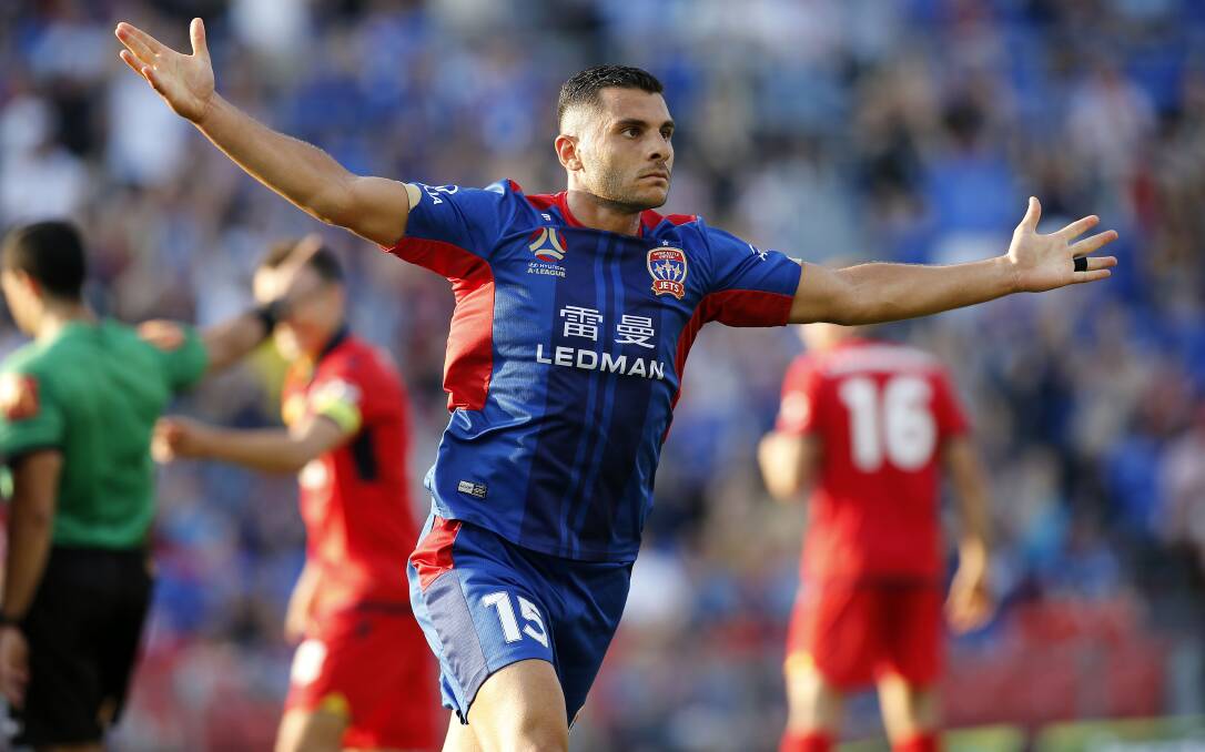 On Target: Andrew Nabbout celebrates after scoring in the Jets 2-1 win over  Adelaide United at McDonald Jones Stadium on Saturday night. Picture: Darren Pateman AAP