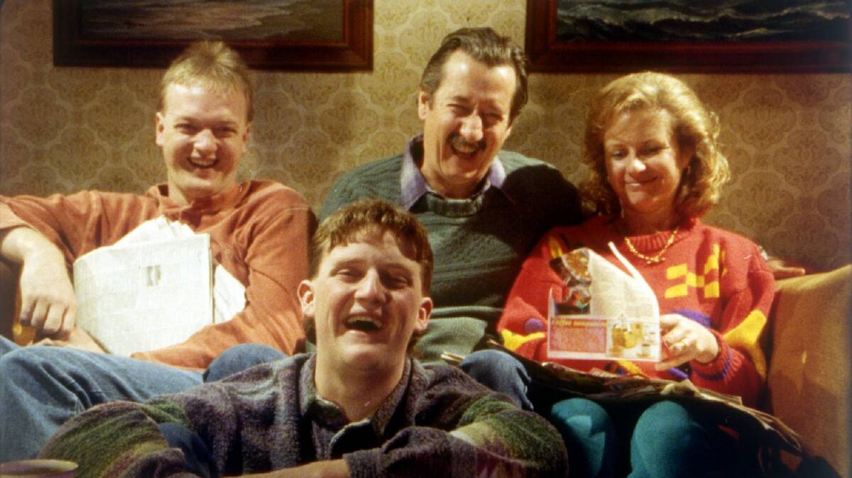 The Kerrigan household: Steve (Anthony Simcoe), Darryl (Michael Caton), Sal (Anne Tenney) and, in front, Dale (Stephen Curry). Photo: Supplied