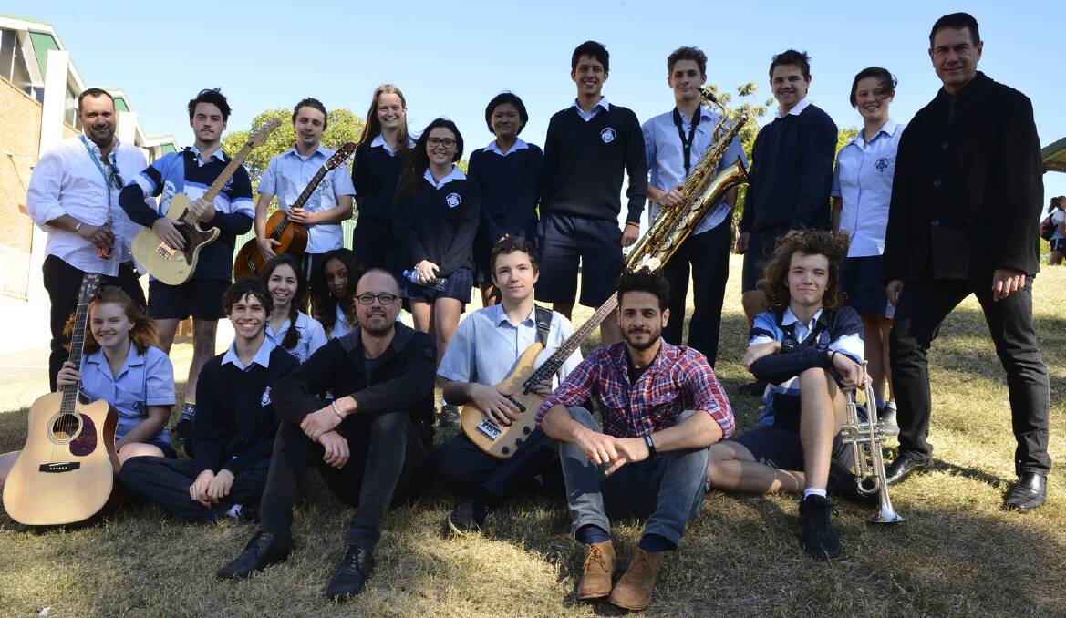 SKILLS: Acclaimed songwriters Stu Hunter and Lior (front) with Maitland Grossmann High School teachers and senior music students.