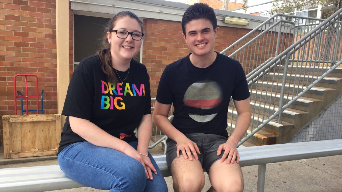 TWO DOWN: Maitland Grossmann High School HSC students Matilda Hubbard, 17, and Tom Brown, 18, after the English 2 exam on Tuesday.