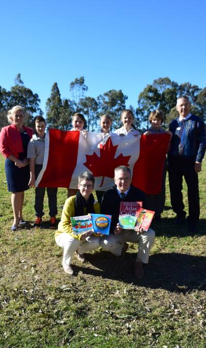 WELCOME: Thornton Public School vice-principal Deanne Brown, principal John Milburn and students with Canadian teachers Brenda and Steve Young.