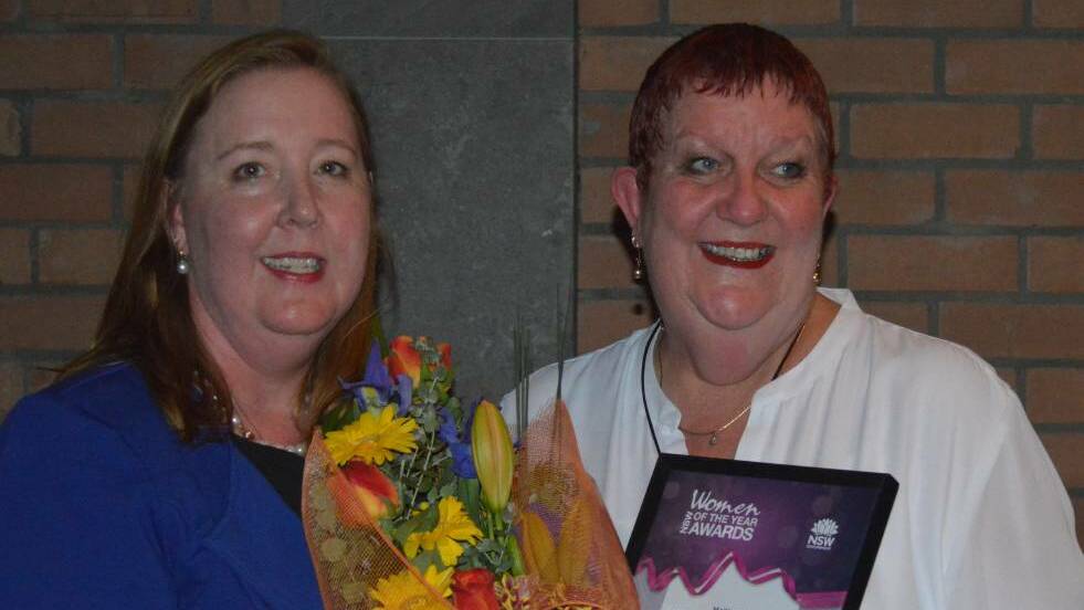 State member for Maitland Jenny Aitchison presenting the 2017 Maitland Woman of the Year award to Naomi Rees.