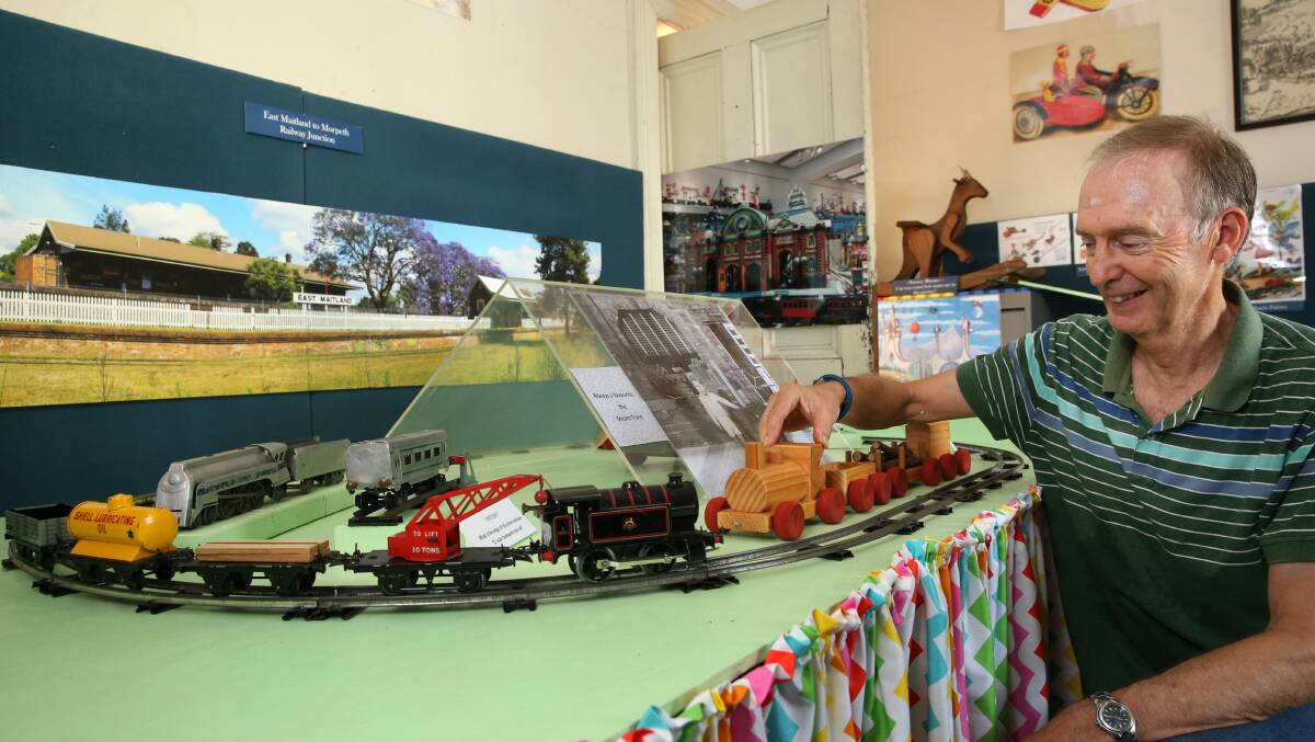 BIG KID: Alan Todd of Morpeth Museum with one of the model trains in the new Children's Room.