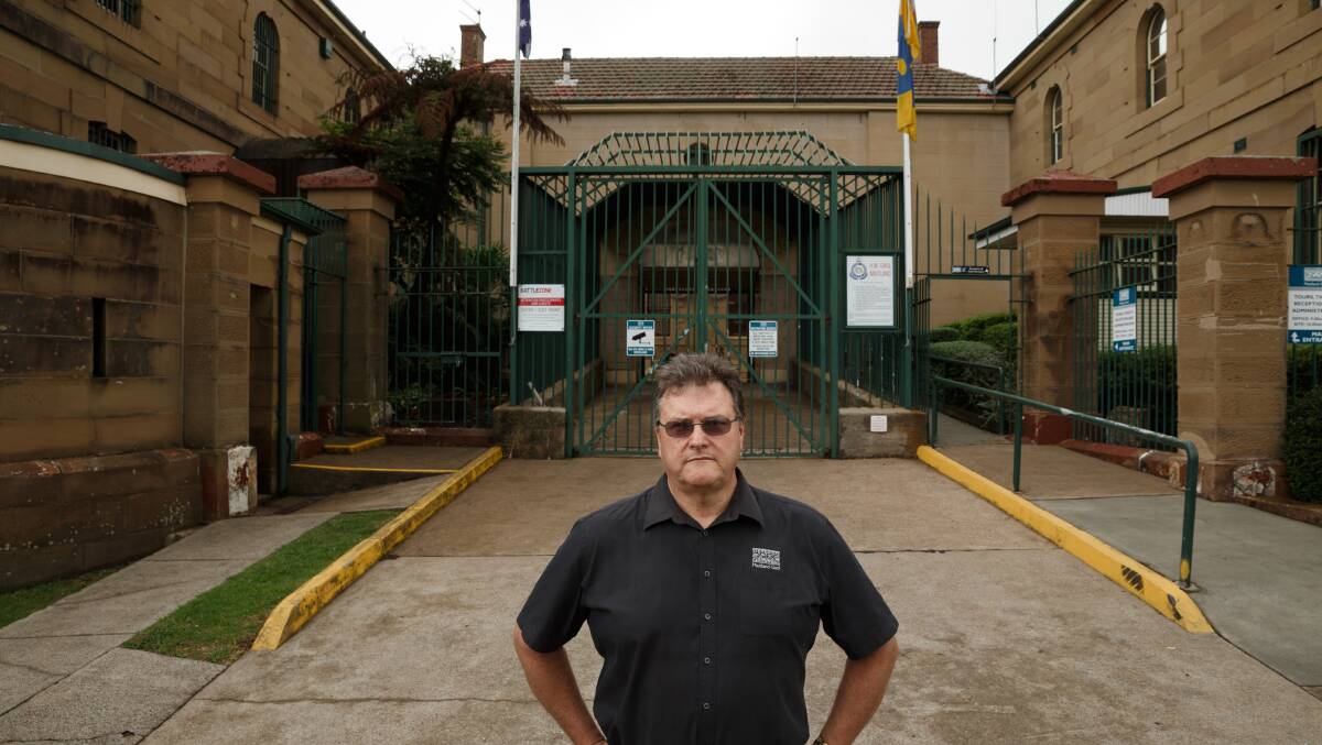 LOCKED IN: Maitland Gaol Coordinator Gordon Sauber pictured at the gaol's front gates. Picture: Max Mason-Hubers.