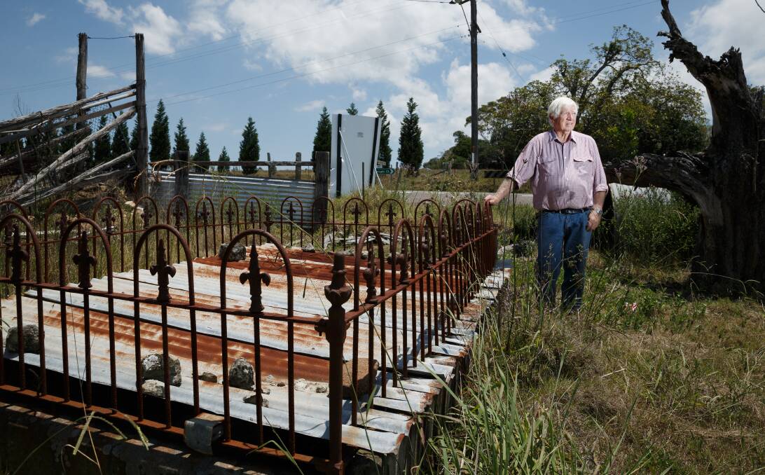 RESTORATION: Cr Arch Humphery pictured at the Dunmore Lang family tomb. Maitland council will investigate the possibility of restoring the site. PICTURE: Max Mason-Hubers.