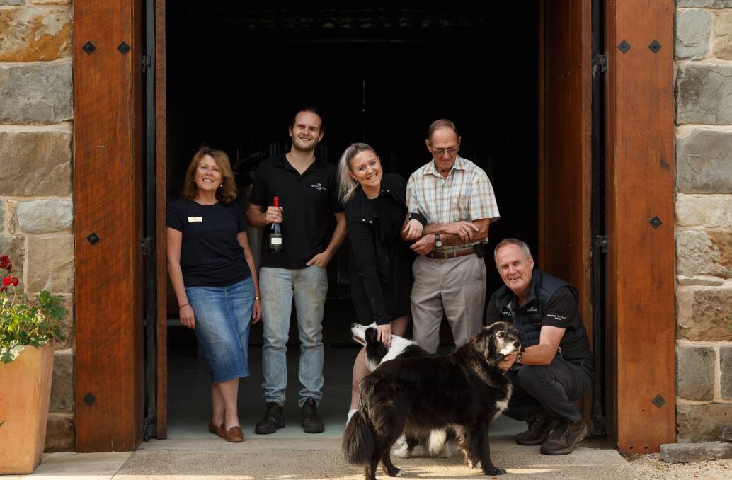 ALL IN THE FAMILY: The Tulloch family from left, Amanda, Alisdair, Jessica, Harry and Keith pictured at the family's Pokolbin vineyard. Picture: Max Mason-Hubers
