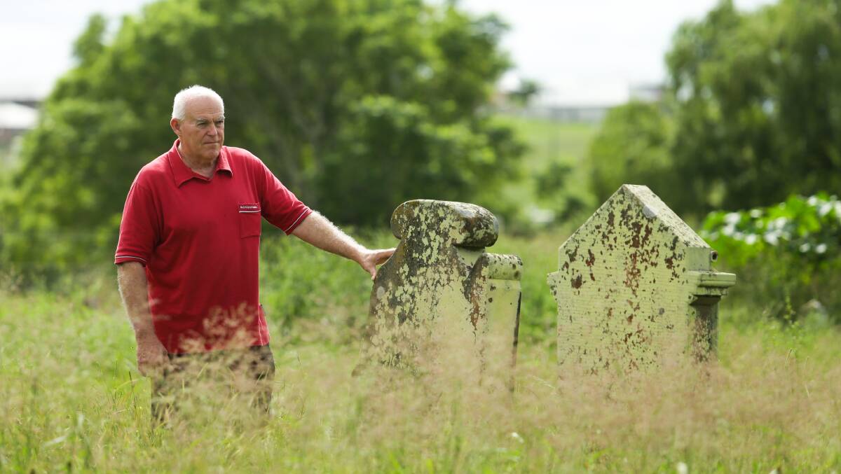 A DISGRACE: Maitland councillor Ken Wethered at the overgrown cemetery. Picture: Jonathan Carroll.