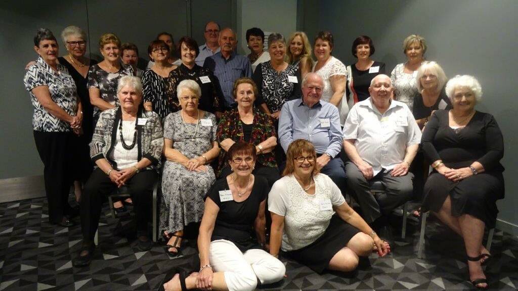 WOOLIES WORKERS: Some of the Woolworths Maitland staff pictured at last Saturday's reunion.