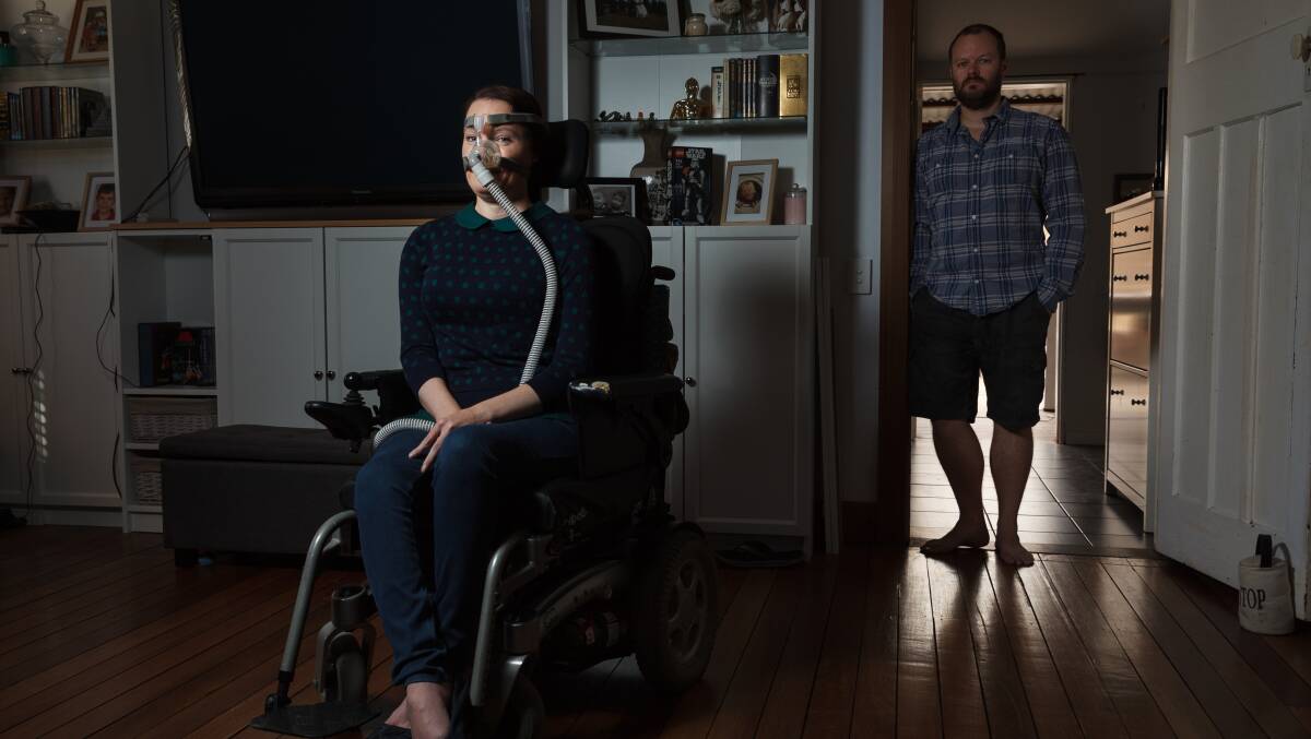 BRAVE: Muscular Dystrophy sufferer Ellen Higginbottom at home with husband Dean. Picture: Max Mason-Hubers.

