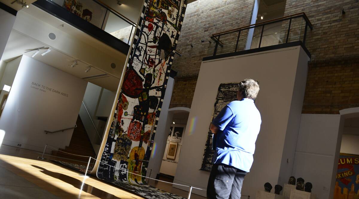 WHAT A WELCOME: Back to the Dark Ages I & II by artist Locust Jones which form the centrepiece of the gallery entrance. 