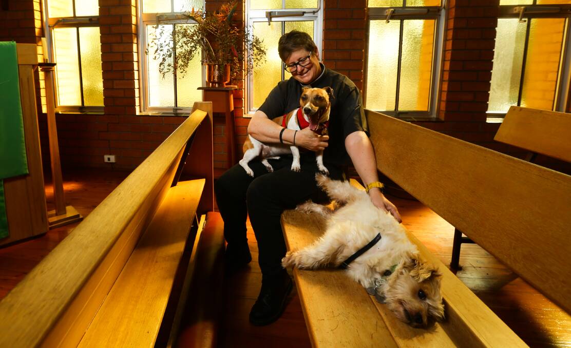 THEY'RE A BLESSING: Mother Moira Evans with Ignatius, on her lap, and Brigid, lying down. Picture: Jonathan Carroll.